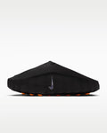 Black sandal with orange sole on a white background